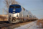 "Maple Leaf" rolls west after making its station stop